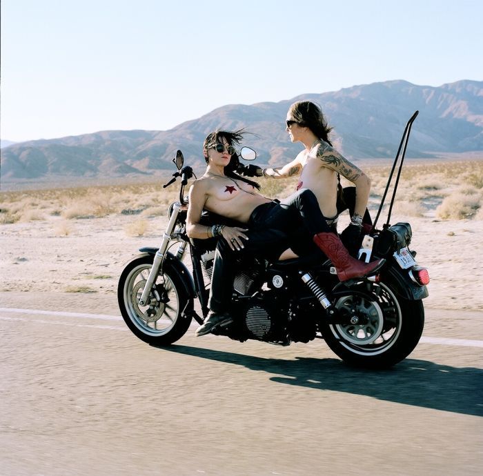 Girls on a motorcycle in Lisbon